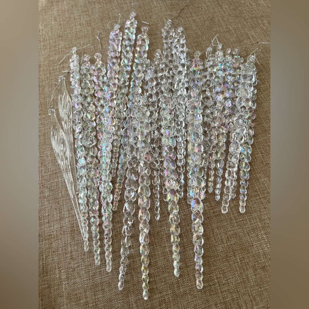 Iridescent plastic Christmas icicle ornaments 22 braided, 2 clear swirl.